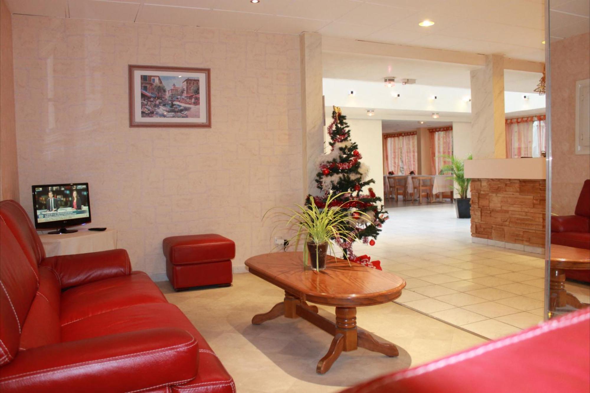 Hotel Le Village Gif-sur-Yvette Esterno foto