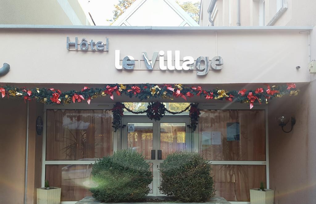 Hotel Le Village Gif-sur-Yvette Esterno foto